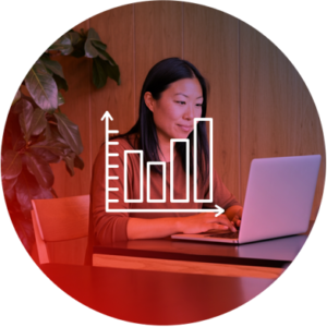 woman using laptop with bar chart icon in the foreground