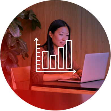 woman using laptop with bar chart icon in the foreground